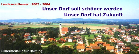 Das Bild zeigt die Gemeinde Haiming als Luftaufnahme. Auf dem Bild ist zu lesen "Landeswettbwerb 2002 - 2004 - Unser Dorf soll schöner werden Unser - Unser Dorf hat Zukunft". Unten links steht geschrieben "Silbermedaille für Haiming!"